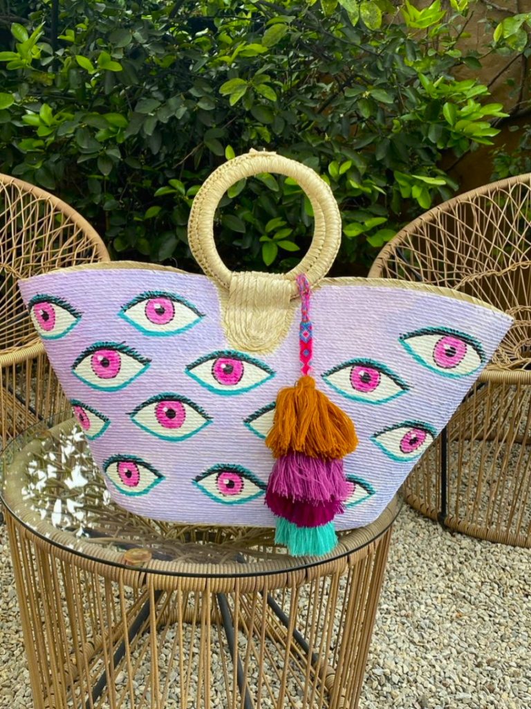 Bolso morado ojos